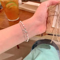 🎀 Elegant Pearl Double Chain Bow Bracelet (Code: ZX#36)