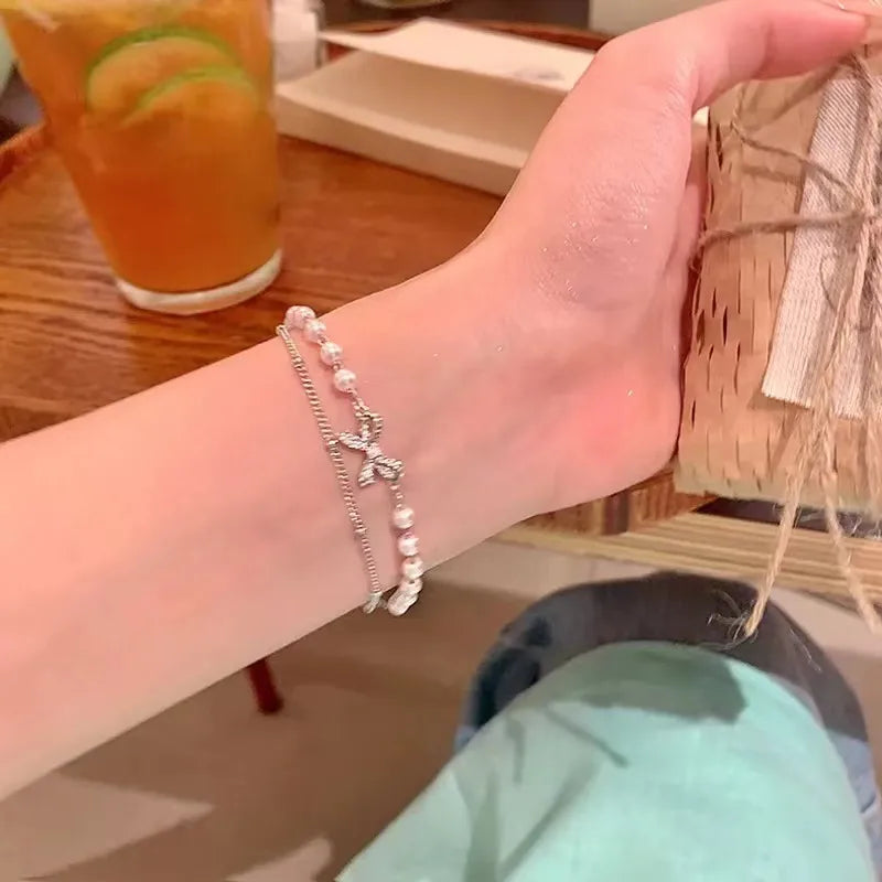 🎀 Elegant Pearl Double Chain Bow Bracelet (Code: ZX#36)